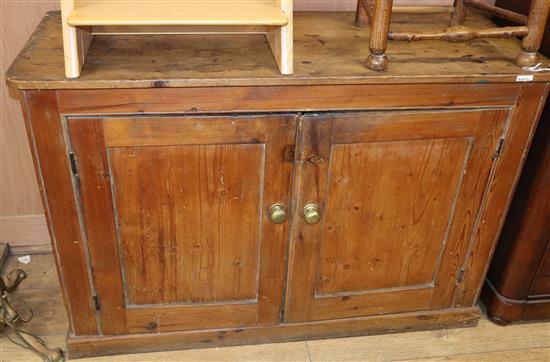 A Victorian pine two door cabinet W.120cm